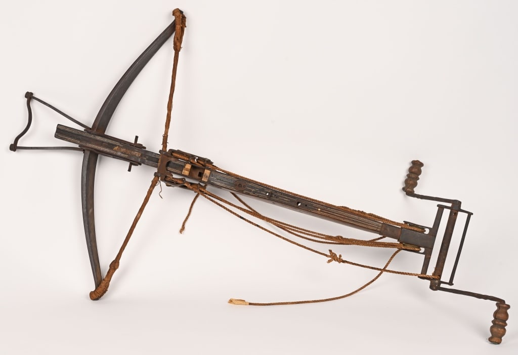 16TH CENTURY ITALIAN FORTIFICATION CROSSBOW: Italian 16th Century Crossbow with a removable cocking device measuring 46 X 30 1/2 inches with the original pull crank and ropes.(broken) Missing the trigger assembly The crossbow, leading missile we