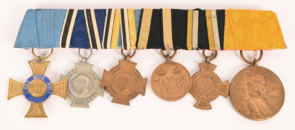 WW1 IMPERIAL GERMAN MEDAL BAR ORDER OF THE CROWN: Imperial German 6 place medal bar to include 1) PRUSSIAN ORDER OF THE CROWN. (Königliche Kronen-Orden IV Kreuz). Instituted in 1861. Type 2. (1867-1918 issue). A gilded bronze Cross Pattée w