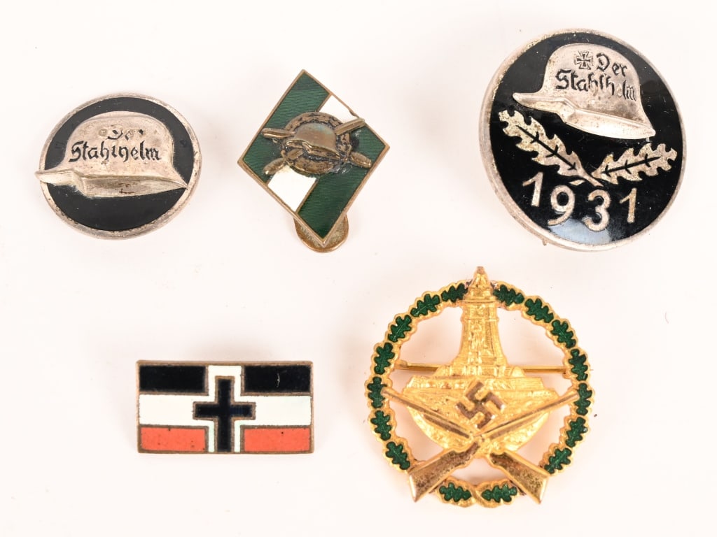 IMPERIAL GERMAN VETERAN BADGE LOT DER STAHLHELM: Lot of 5 Der Stahlhelm & DRKB related items to include 1) 1931 STAHLHELM MEMBER'S COMMEMORATIVE ENGRAVED BADGE. A slightly convex, 31mm diameter, nickel-silver alloy badge, against whose black e