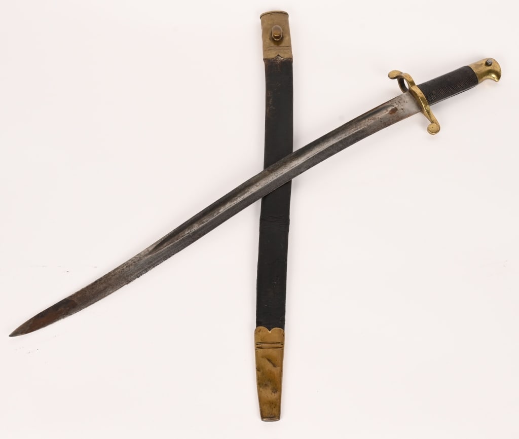 ENGLISH TYPE 1860 BRASS SWORD BAYONET W SCABBARD: Rare British Colonial issue for the tropics having brass fittings. The design is based on the British P-1856 Two Band percussion Short Rifle often issued to Artillerymen. It measures 24 3/4 inches, wi