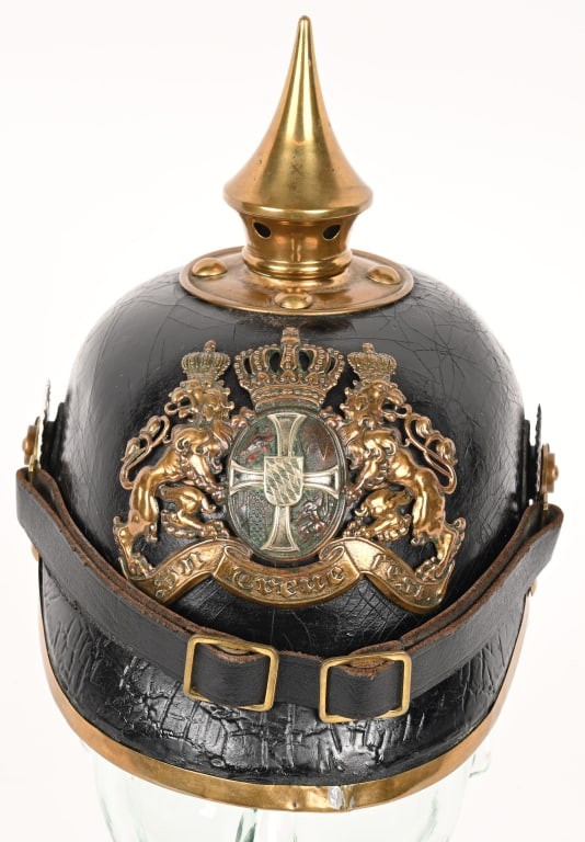 WWI IMPERIAL GERMAN BAVARIAN 12TH JR SPIKED HELMET: Bayern Pickelhaube für Offizier der Infanterie. A well-preserved Bavarian Infantry Regiment Reserve Officers Pickelhaube, constructed of a pressed black leather shell. Affixed to the disc with fo