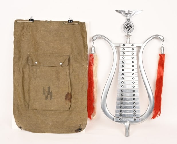 WWII NAZI GERMAN SS GLOCKENSPIEL W ISSUE CASE: A fine, highly desirable Third Reich-era musical instrument, an aluminum lyre-shaped glockenspiel, approx. 36" x 21", with a single board of metal keys and upper arms decorated with the heads of eagle
