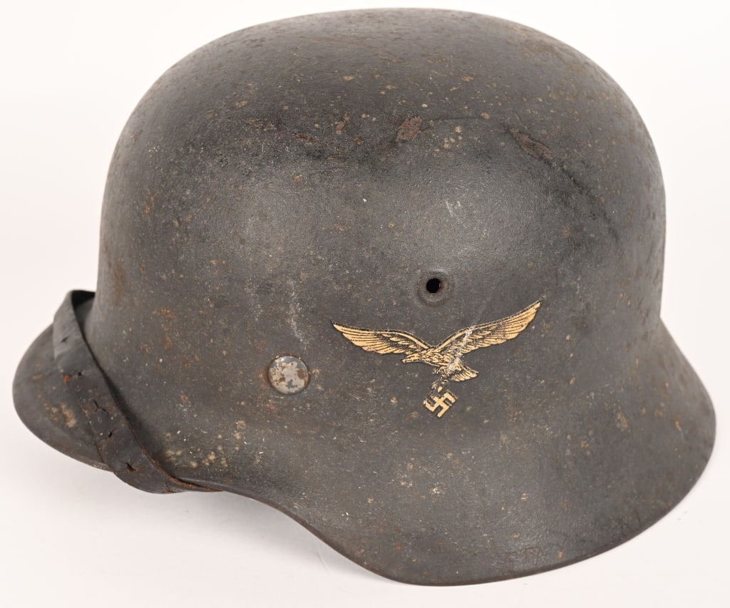 WWII NAZI GERMAN M40 LUFTWAFFE HELMET EF62 WW2: The stamped, sheet steel construction helmet retains about 90% of its field gray paint. The left side of the helmet has a National Eagle decal which is retained 95%. All three liner retaining ri