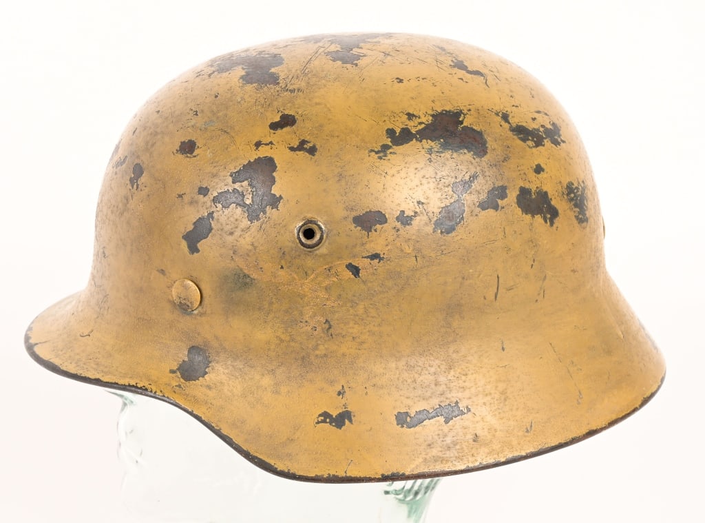 WWII NAZI GERMAN LUFTWAFFE CAMO M40 HELMET: German World War II Luftwaffe M-40 Single Decal Camouflage Combat Helmet. The exterior has the Luftwaffe flying eagle decal (Under the camo paint). The sand camouflage tropical paint shows minor wear,