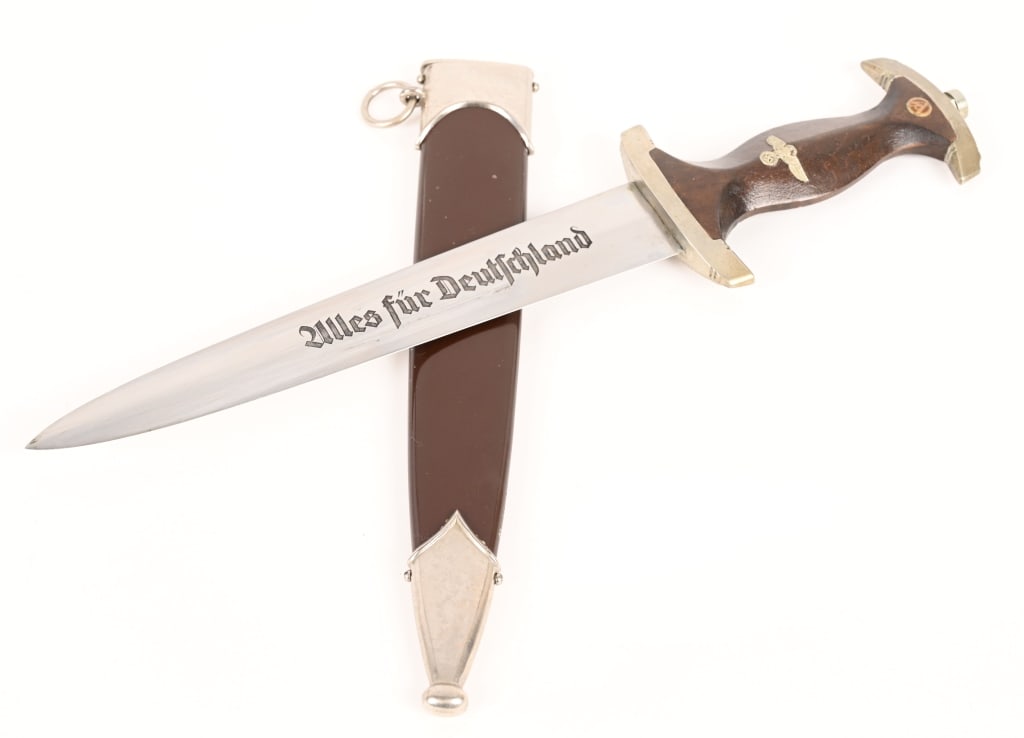 WWII NAZI GERMAN SA DAGGER BY AESCULAP TUTTLINGEN: Early, nice quality dagger features a roughly, 8 3/4", (22.2 cm), long, double edged, nickel/silver plated, drop forged steel construction blade with a low central ridge and a full length, including