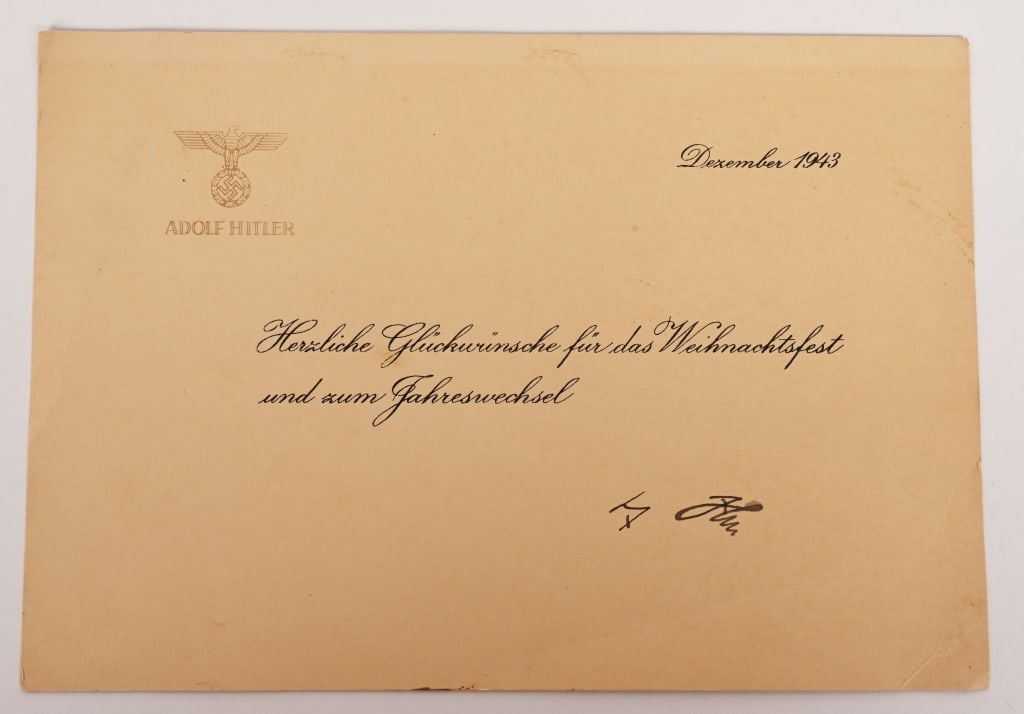 WWII NAZI ADOLF HITLER SIGNED CHRISTMAS CARD WW2: Adolf Hitler personal Christmas / New Year card December 1943. High quality paper with national eagle "Adolf Hitler". Hand signed by Hitler himself. Card in excellent condition. No repairs, no