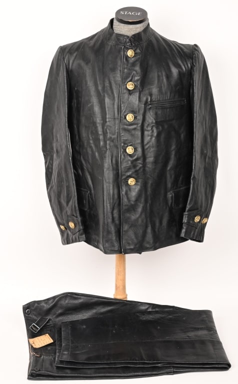WWII NAZI GERMAN KRIEGSMARINE LEATHER UNIFORM WW2: Three-quarter length, multi-panel, blackened leather construction jacket features a vertical, five button, front closure with a two metal hooks and eyelets positioned at the forward neckline and a sma