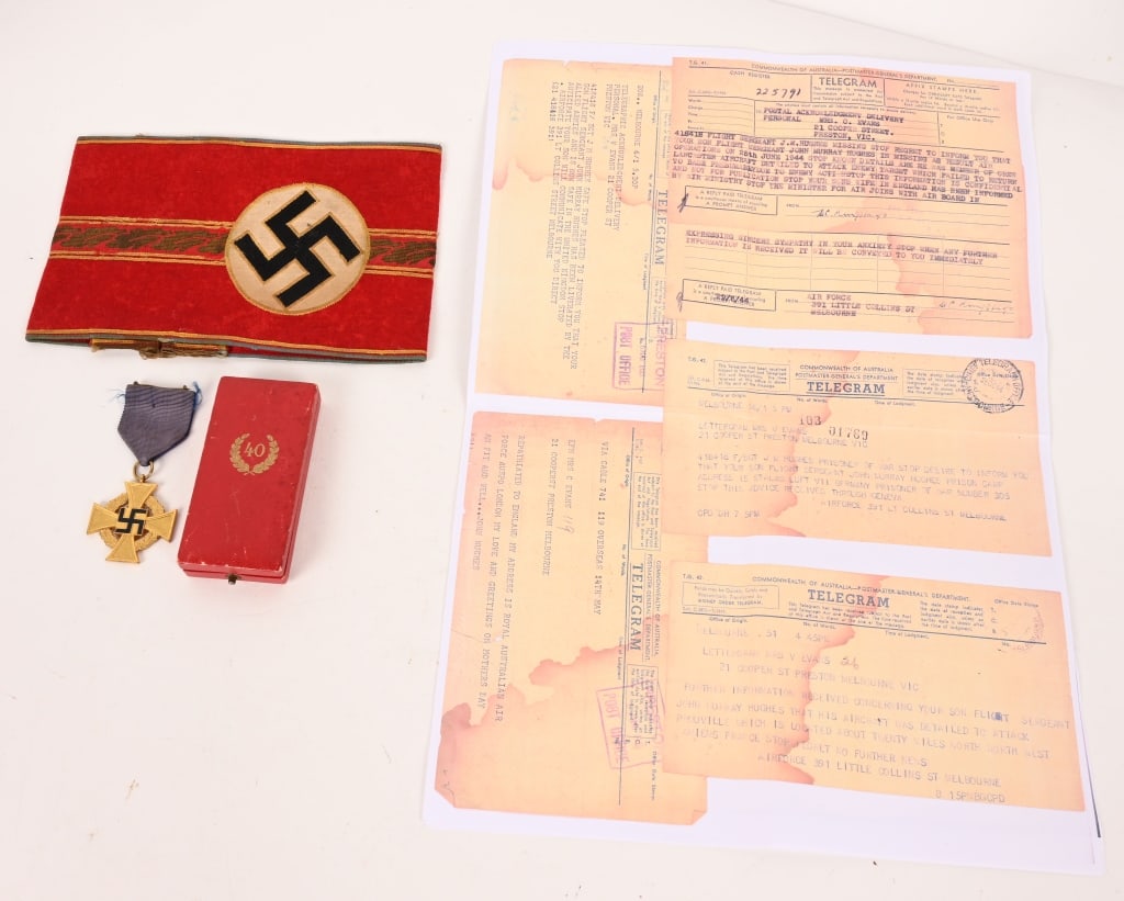 WWII NAZI GERMAN ORTS LEVEL NSDAP ARMBAND GROUP: WWII Nazi German Orts level armband and a Cased 40 year Decoration Medal brought back by an Australian Soldier. The lot includes 1) WWII NAZI GERMAN ORTS LEVEL NSDAP ARMBAND WW2. NSDAP Orts Level Admi