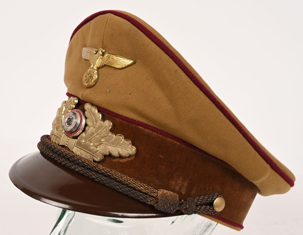 WWII NSDAP GAULEITUNG POLITICAL LEADERS VISOR CAP: Nice quality 1939 pattern, Gauleitung level, Political Leader’s visor cap in light tan wool with a subtle whipcord weave. The cap features a light brown velvet centerband and dark red wool pipin