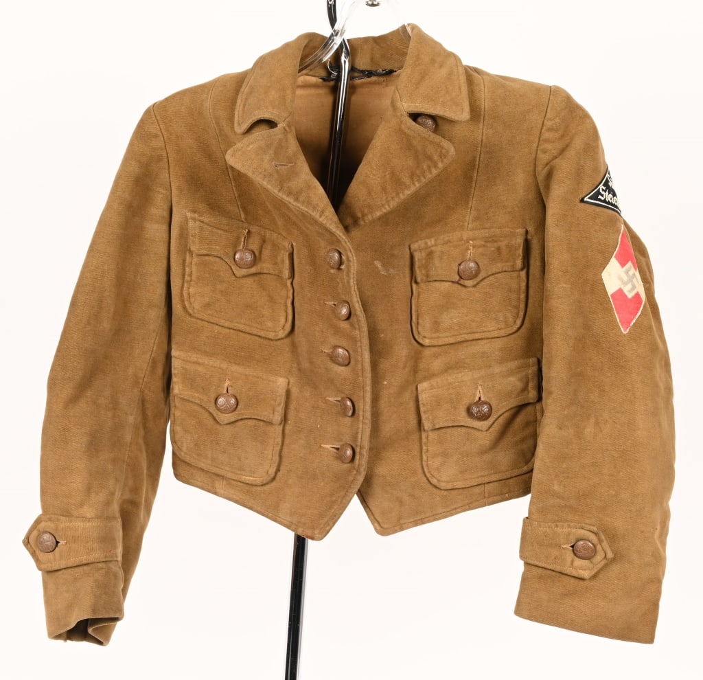 WWII NAZI GERMAN HITLER YOUTH BDM JM JACKET WW2: Light tan colored velour, (imitation suede), construction jacket features a five button front closure with small fold back peak lapels and a lay down collar. The jacket has two, small, pleated, patch