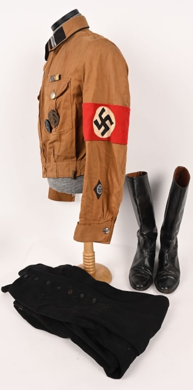 WWII NAZI GERMAN NSKK BROWNSHIRT UNIFORM WW2: Light tan cotton twill construction shirt with a five button front closure with the top and bottom button being a brown bakelite stitched button. Shirt features two pleated patch breast pockets with s