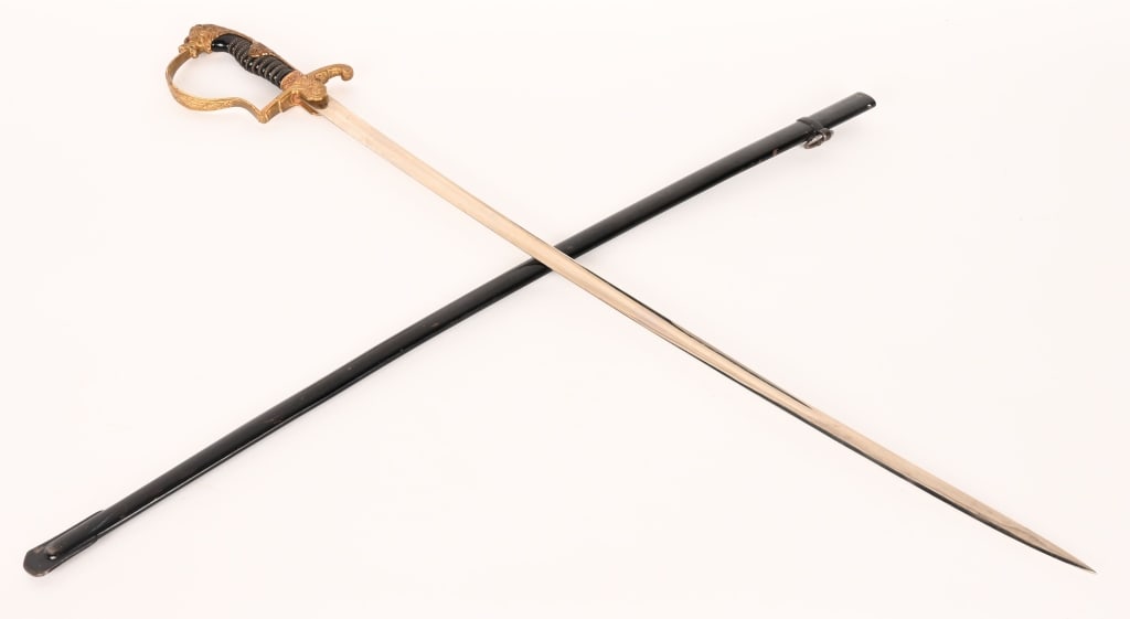 WWII NAZI GERMAN LION HEAD SWORD RED EYES EICKHORN: Nazi German Officers lion head sword with red eyes. Plain blade is in excellent condition and has the Eickhorn logo and name partially obscured by the langet. Grip and wire wrap intact with one wire s