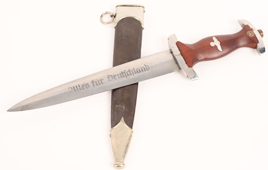 WWII NAZI GERMAN DAGGER BY F. UND A. HELBIG WW2: A rare RZM production M7/73 SA dagger with magnetic steel cross guards, made by F. und A. Helbig. Helbig and David Malsch (M7/70) were known to produce SA daggers with steel cross guards, typically la