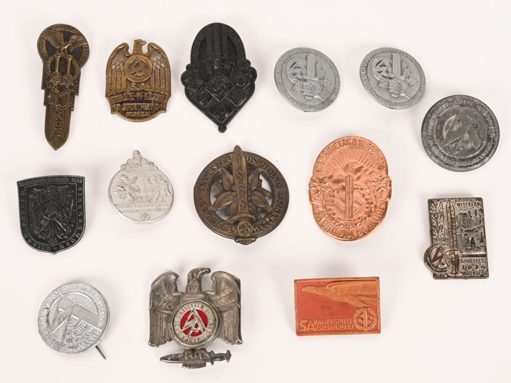 WWII NAZI GERMAN SA TINNIE LOT STURMABTEILUNG WW2: WWII Nazi German Tinnie lot of the SA . All tinnies are in excellent condition. The Sturmabteilung 'Storm Division' or loosely 'stormtroopers', or SA, was the original paramilitary organisation under