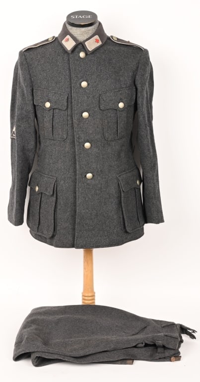 WWII NAZI GERMAN RED CROSS UNIFORM WANZLEBEN 3 WW2: 1938 pattern tunic of the type worn by the "Deutsches Rotes Kreuz"("German Red Cross"), or DRK. It is constructed of charcoal gray wool, with a patch-style pocket on each breast, and a further similar