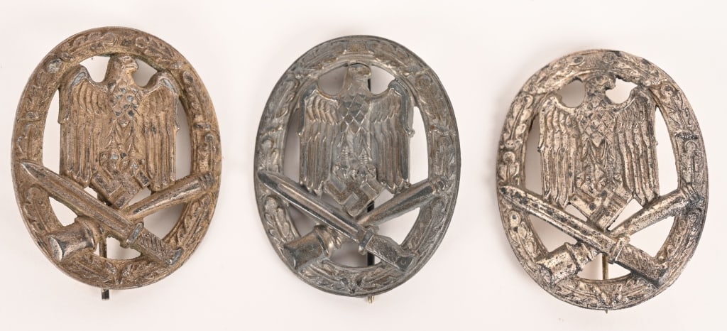 WWII NAZI GERMAN GENERAL ASSAULT BADGE LOT WW2: Lot of three WWII Nazi General Assault Badges to include 1) GENERAL ASSAULT BADGE. Die struck, partially scooped backed, alloy construction award with a silver wash features a cut-out, high relief, We