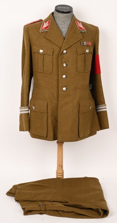 WWII NAZI GERMAN SA GRUPPENFÜHRER UNIFORM WW2: A brown wool private purchase single-breasted tunic. The tunic has a pleated patch pocket to each breast, both with scalloped flaps secured by a single button, and two slash hip pockets, both with fla