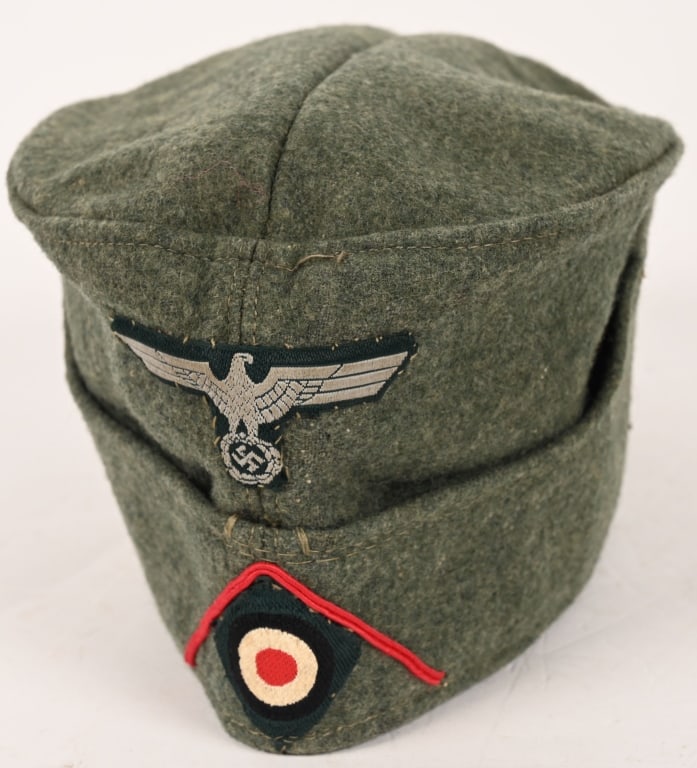 WWII NAZI GERMAN ARTILLERY M34 OVERSEAS CAP WW2: Field-gray, wool/rayon blend construction cap with fold down side and back panels with gently sloping, downward scallops to the front and forward sides. As is typical the fold down panels are hand sti