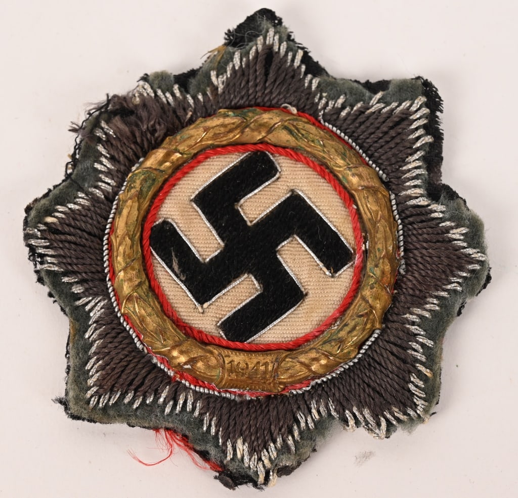 WWII NAZI CLOTH GERMAN CROSS IN GOLD AWARD WW2: Hand embroidered example features a double, overlaid, eight point, sunburst pattern with the top, inner layer, sunburst in matte, brownish/gray, cotton threads, and the bottom, outer layer, in bright,