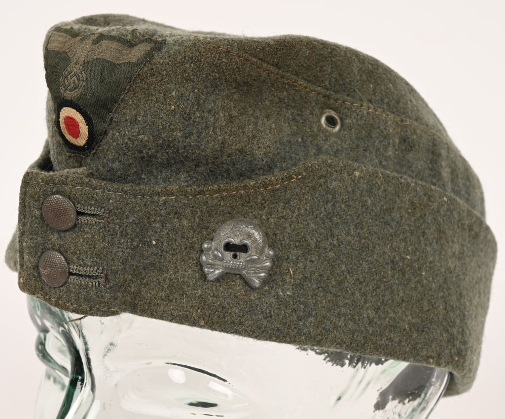 WWII NAZI GERMAN PANZER M42 OVERSEAS CAP WW2: Field-gray wool/rayon blend construction cap with fold down back and side panels with scalloped front edge and forward sides, and two pebbled, magnetic sheet metal button front closure. Back and side