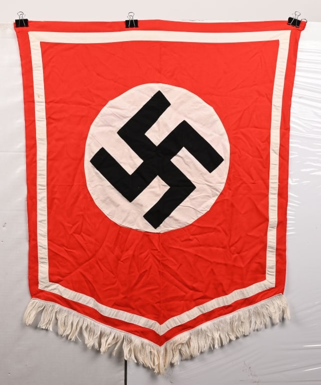 WWII NAZI GERMAN PODIUM BANNER SHIELD SHAPED WW2: Single sided cotton podium banner with a separately applied swastika on the applied disc. Machine stitched white trim. 30" x 36". NEAR MINT!