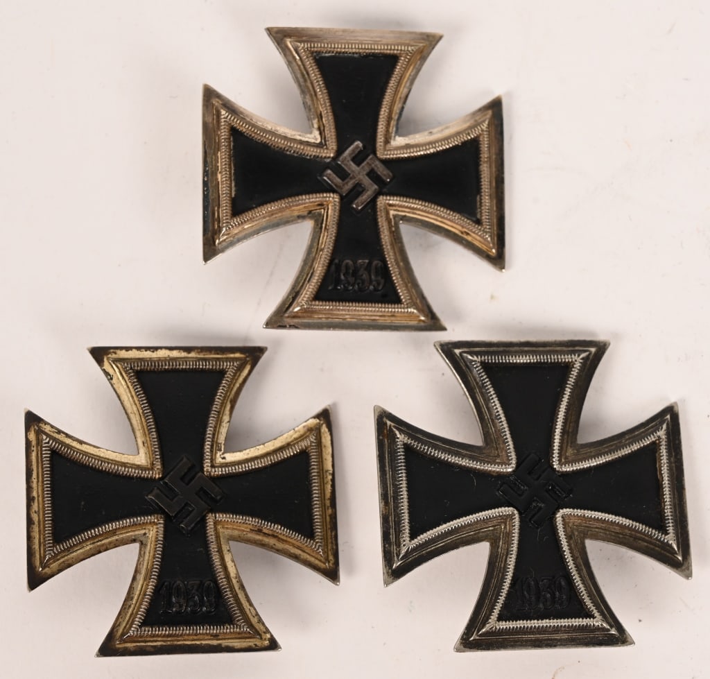 WWII NAZI GERMAN IRON CROSS 1ST CLASS WW2 LOT: Lot of three, WWII Nazi German Iron Crosses to include 1) IRON CROSS 1ST CLASS, 1939 "L/16" Nice worn example of the classic WWII Iron Cross 1st Class. Magnetic center, which displays most of its orig