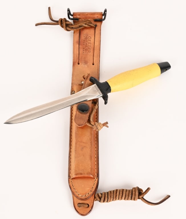 VIETNAM US NAVY SEAL MEMBER GERBER WS2 DIVE KNIFE: WS2: WHITE STAG 2 : "DIVE" with Armorhide handle made of 440C steel with narrow WASP and no teeth with a short 6 inch blade and no serial numbers on the blade. Stamped GERBER on the obverse with STAIN