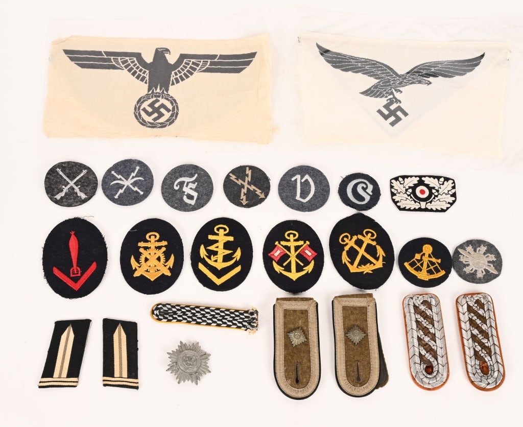 WWII NAZI GERMAN INSIGNIA LOT HEER LUFTWAFFE KM: Lot of Nazi German Insignia to include 1) LUFTWAFFE FLIGHT & AIR SIGNALS ARMORER'S TRADE BADGE. The badge consists of a roughly, 55mm diameter Luftwaffe blue/gray wool construction base with machine e