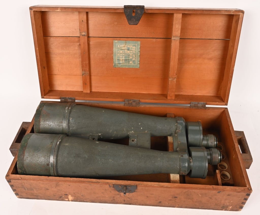 WWII JAPANESE 20X120 3° BIG EYE BINOCULARS W CASE: Imperial Japanese Navy 20 X 120 3° Big Eye Binoculars in the original Case of Issue. Also has the name of the Veteran who souvenired the optics CAPT. M. M. RIKER COM PHIB PAC. These particular Bi