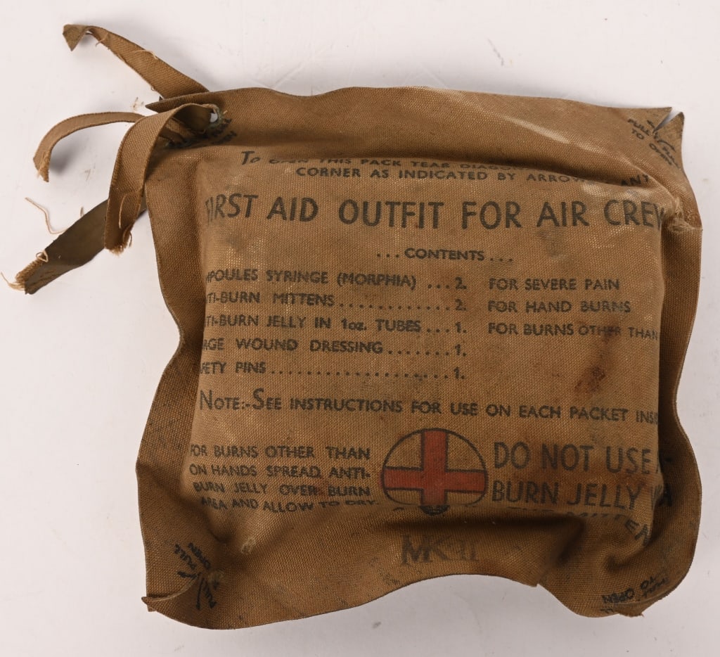 WWII BRITISH AIRMAN PARATROOPER FIRST AID KIT WW2: WWII Royal Air Force RAF Personal Aircrew First Aid Pack MKII. A rare complete unopened example with all of its contents. Printed instructions to both sides and clear AM issue stamps and MKII. These i