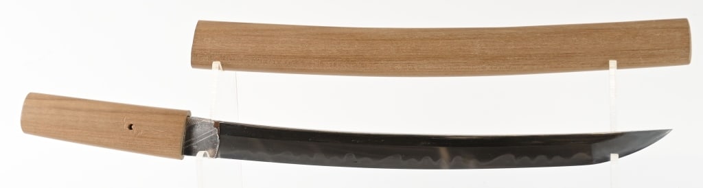 JAPANESE WAKIZASHI SAKAIMINANOTO KANEMORISAKU: 18 3/8" blade with 13 1/2" cutting edge. The blade is bright with an active hamon and is excellent overall. The one hole tang is signed on one side. It has a silver faced copper habaki. Includes a