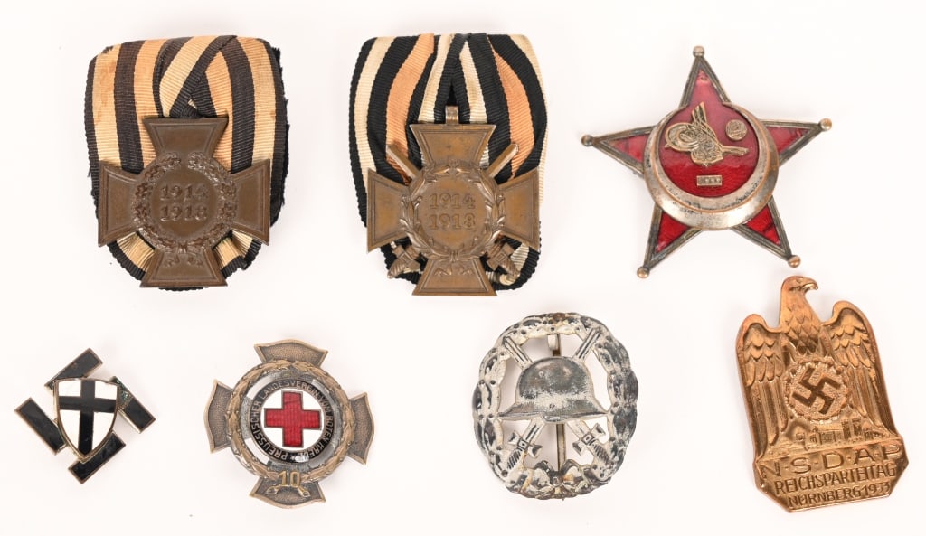 WWI AND WWII IMPERIAL & NAZI GERMAN MEDAL LOT WW2: Lot of Medals to include 1) WW1 TURKEY GALLIPOLI STAR MEDAL 1915 WWI. The medal, made of nickel-plated brass, has a vaulted star-shaped badge, 56 mm across the diagonal span of the arms. The tips of