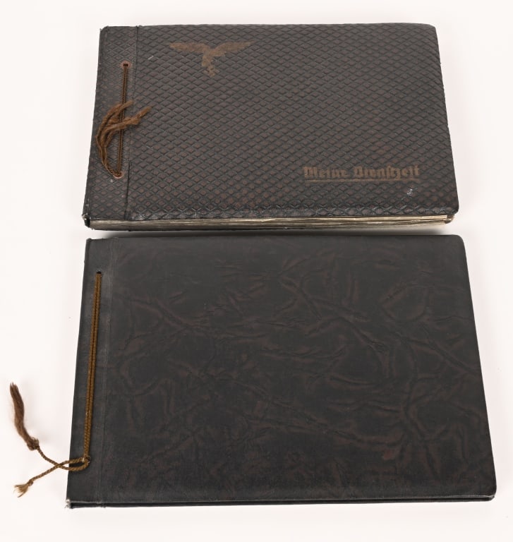 WWII NAZI GERMAN PHOTO ALBUM LUFTWAFFE HEER WW2: Lot of two WWII Nazi German Military Photo Albums to include 1 Luftwaffe with roughly 69 photos and the other being a Heer album with roughly 249 photos showing dad to day life and landscapes with sev