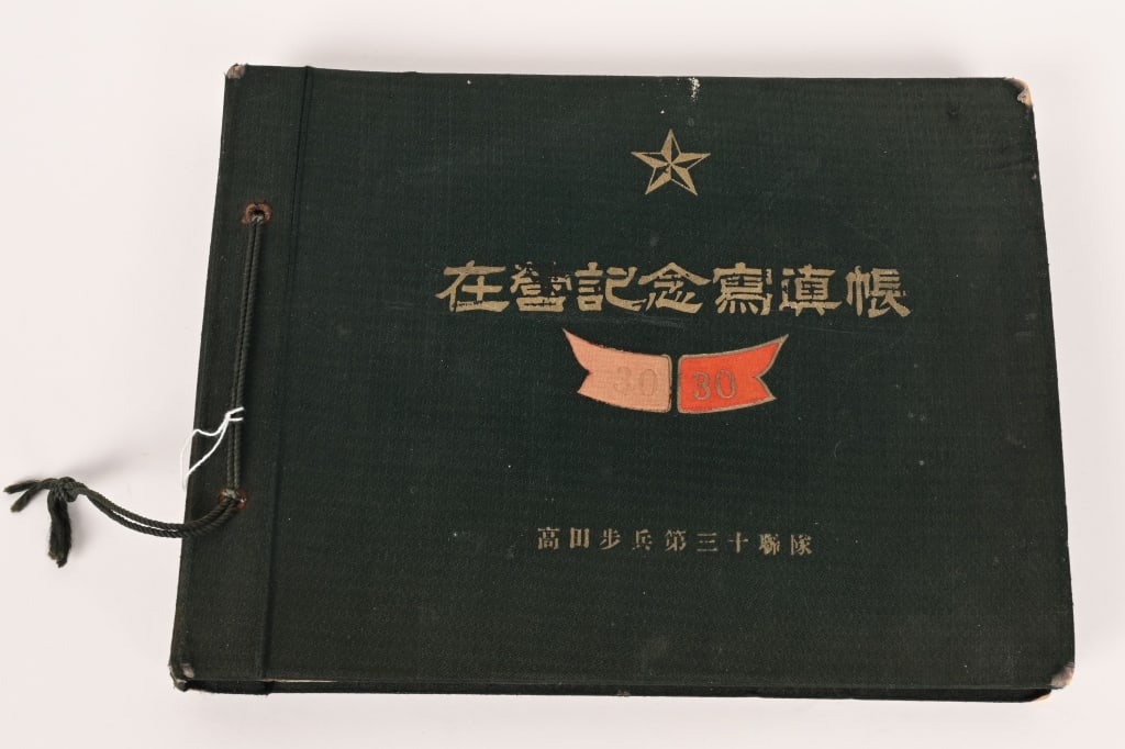 WWII JAPANESE OFFICERS PHOTO ALBUM WW2: Imperial Japanese photo album with 80 photos with several portrait photos of Officers wearing their medals. Also several photos of men in the field wearing combat gear. Excellent.