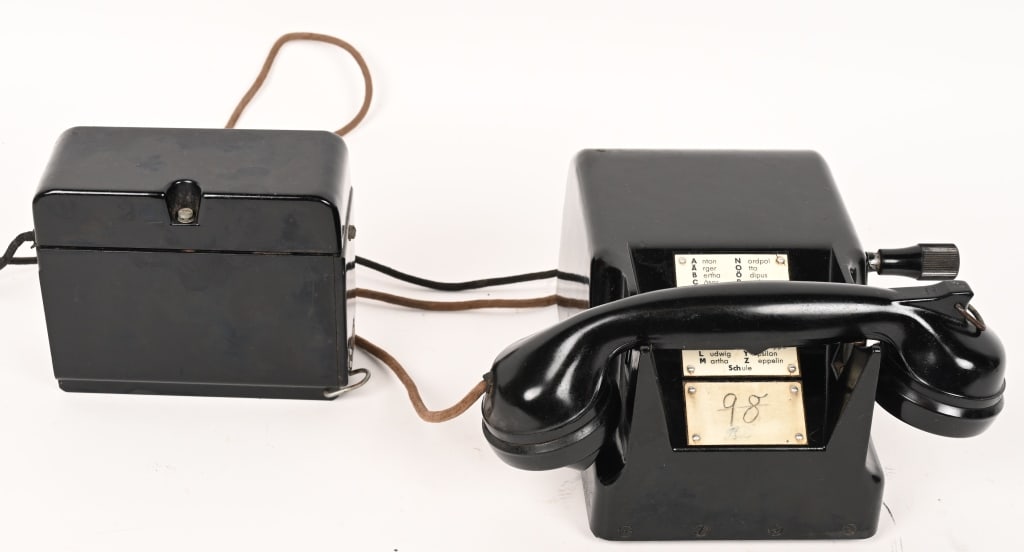 WWII NAZI GERMAN WEHRMACHT FIELD TELEPHONE TYPE 38: Model 38, Bakelite housing, with hand crank, housing with “WaA” stamp, manufacturer label “1940 dated” (= Heliowatt Werke, Elektrizitäts-Aktiengesellschaft Werk Schweidnit