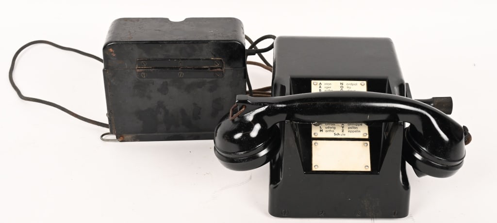 WWII NAZI GERMAN WEHRMACHT FIELD TELEPHONE TYPE 38: Model 38, Bakelite housing, with hand crank, housing with “WaA” stamp, manufacturer label “1940 dated” (= Heliowatt Werke, Elektrizitäts-Aktiengesellschaft Werk Schweidnit