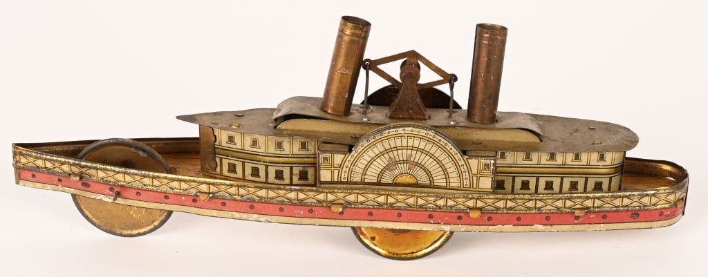 GERMAN TIN FLYWHEEL SIDE WHEEL BOAT: All original early toy. Very nice condition. Fly wheel works. 10 1/2" Excellent