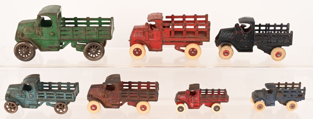 7- CAST IRON MACK STAKE BED TRUCKS (1 of 3)
