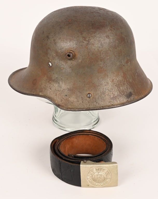 WW1 IMPERIAL GERMAN / REICHSWEHR HELMET & BELT WWI: Lot of German militaria to include 1) Imperial German M16 Helmet Shell. The stamped, sheet steel construction helmet retains some of its original finish but has been cleaned. Shell is marked Bf6