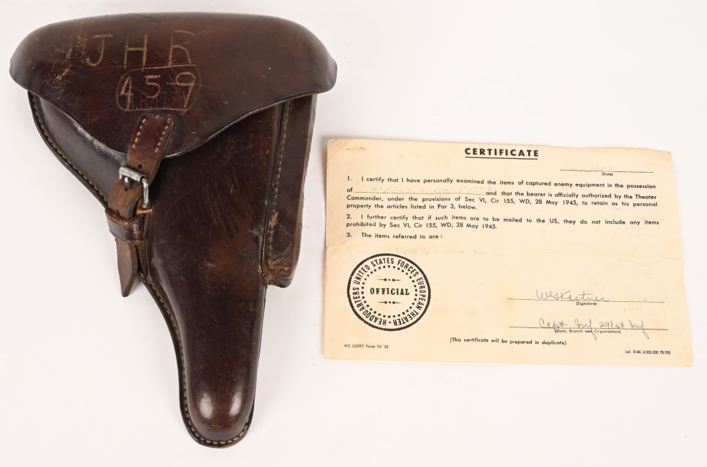 WWI GERMAN P.08 LUGER HOLSTER W CAPTURE PAPER WWI: Brown leather military holster unit marked to the interior and dated 1910. Includes an aluminum bottom magazine, with a steel body. Serialized on the bottom, and has a "495 h" eagle proof 68. The Pist