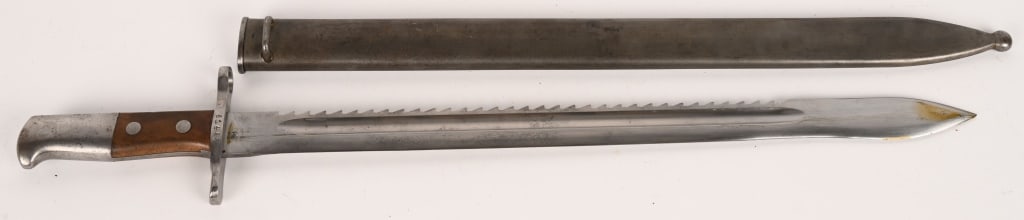 WWI M 14 SWISS PIONEER SAWTOOTH BAYONET NEUHAUSEN: WWI M1914 Swiss Waffenfabrik Neuhausen Sawtooth Bayonet for the Schmidt-Rubin Carbine. The number on the guard is 61495. The Blade Length is 19", the Handle Length is approximately 5", and the Overall