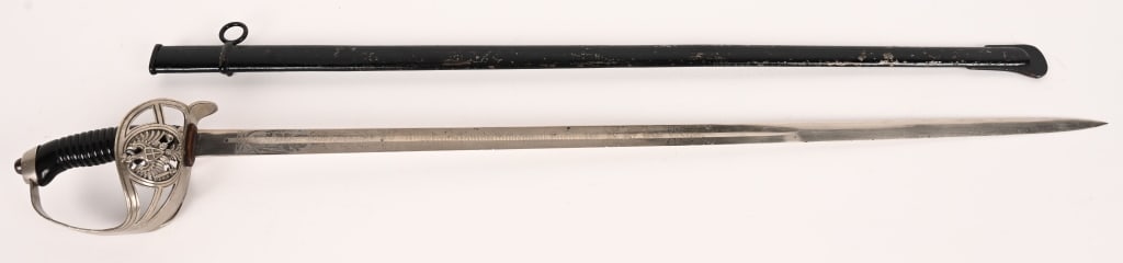 WWI IMPERIAL GERMAN MODEL 1889 PRUSSIAN INF SWORD: (Husaren-Regiment „König Wilhelm I.“ Nr. 7 Offiziersdegen M89). A well-preserved M89 pattern commemorative sword, measuring 93.5 cm in total length when inserted into the scabbard. It