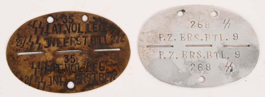 WWII NAZI GERMAN WAFFEN SS DOG TAGS LATVIAN PANZER: Lot of two Waffen SS Dog Tags to include 1) Aluminum Tag that reads 268 SS P.Z. ERS. BTL. 9 . A Panzer Jager Unit. 2) Brass Latvian SS Tag that reads 35 SS. LAT.VOL.LEG 2./SS. JNEERST.BTL.272 and to t