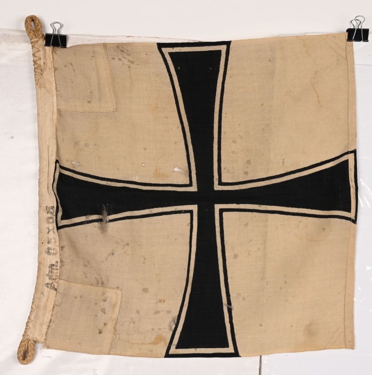 WWII NAZI GERMAN KRIEGSMARINE ADMIRAL FLAG KM MARK: A double sided Kriegsmarine Admiral printed white constructed flag with a narrow Iron Cross. The bunting is marked Adm. .05 X .05. Flag is reinforced to each corner. Has several moth holes but is stil