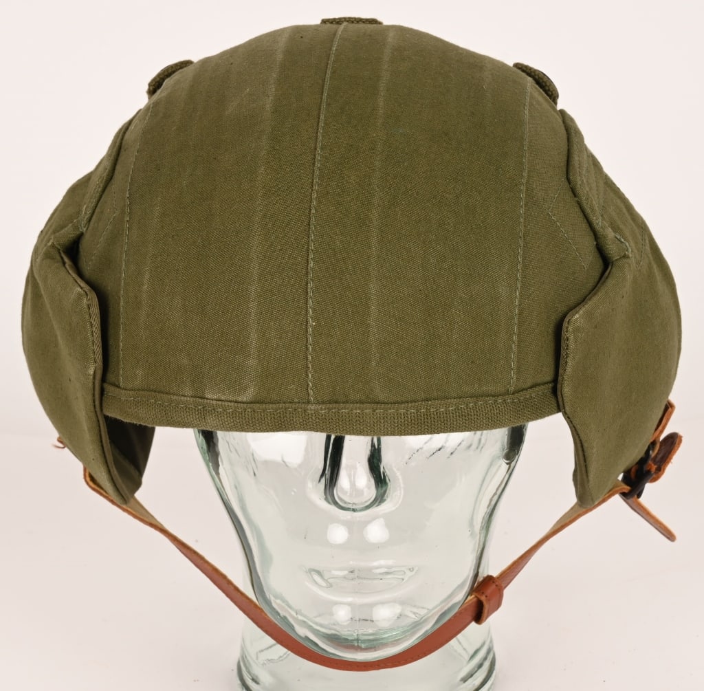 WWII US AIR CORPS AIRCREW M4A2 FLAK HELMET WW2: Original era manufacture. Dark OD cloth covered steel helmet with folding ear covers. Issued to USAAF bomber crews for protection against enemy Flakand Fighters during WWII. Light age and wear, very c