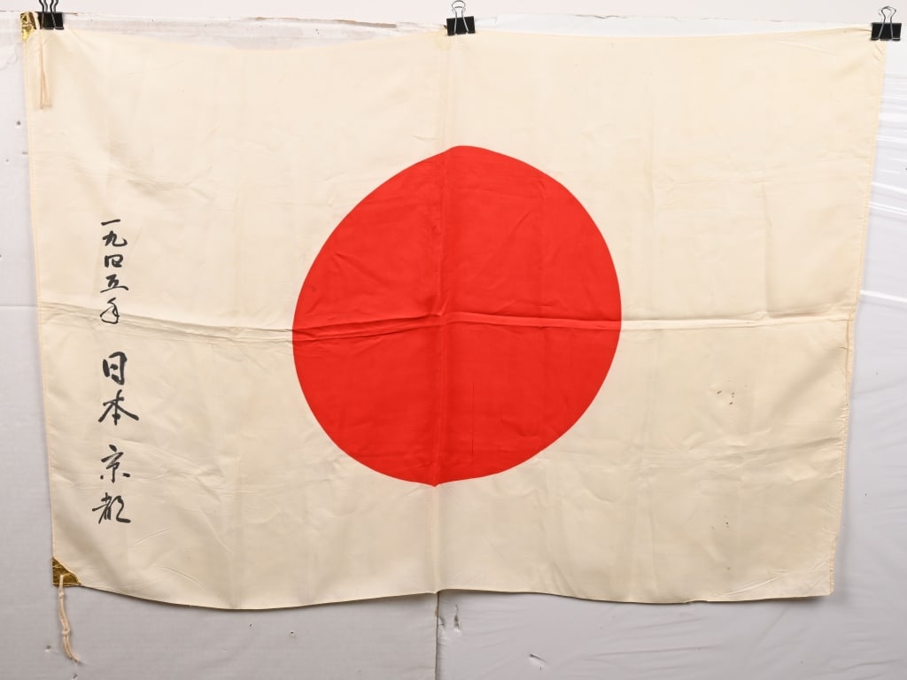 WWII JAPANESE ARMY SOLDIERS NATL. FLAG W/ KANJI: Large WWII Japanese National Flag with Kanji. Flag is made of silk and measures 40 X 27 inches with the original leather corners.
