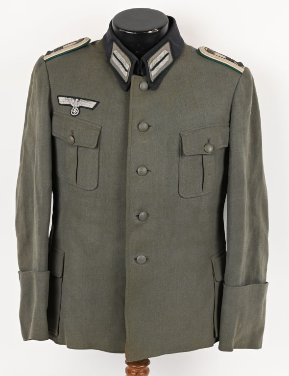 WWII NAZI GERMAN ADMIN OFFICER'S M36 TUNIC WW2: Nice quality private purchase field-gray wool/rayon blend construction tunic features a vertical five button front closure with dual metal hooks and eyes positioned at the forward neckline. Administra