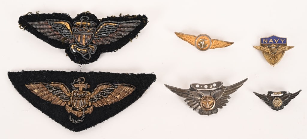 WWII US NAVY MARINE CORPS PILOT WING NAVAL AVIATOR: Lot of WWII US Navy or Marine Corps Naval Aviator wings to include 1) BULLION 2 3/4 INCH WINGS ON WOOL BACKING. Beautifully made with multiple colored metallic treads. 2) BULLION 2 3/4 INCH WINGS ON W