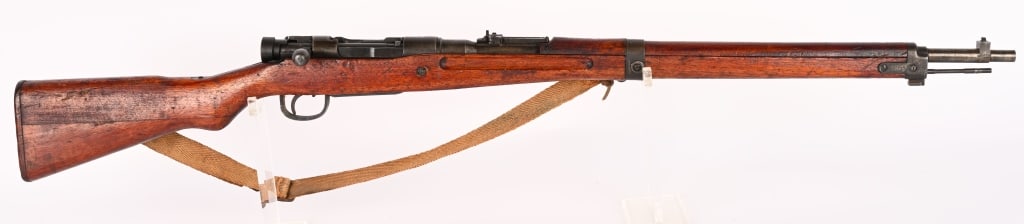 JAPANESE TYPE 99 ARISAKA BOLT ACTION RIFLE 7.7 MM: SERIAL NUMBER: 37176. BARREL: 26". CALIBER: 7.7 JAP. MANUFACTURED; 1944-45. Toyo Kogyo / Kokura made rifle. Mum is intact. No import marks found. Matching serials on the receiver and bolt/bolt compone