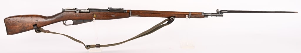 MOSIN-NAGANT M-91/30 BOLT ACTION RIFLE 7.62 X 54R: SERIAL NUMBER: Y00N3624 BARREL: 29" CALIBER: 7.62 X 54R MANUFACTURED: 1943 IN RUSSIA imported by C.A.I. . Metal is blue finish steel with hooded front sight and leaf type rear. Stock is wood with oil 